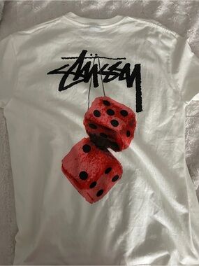 Stussy White Tee with Red Dice Graphic and Black Logo